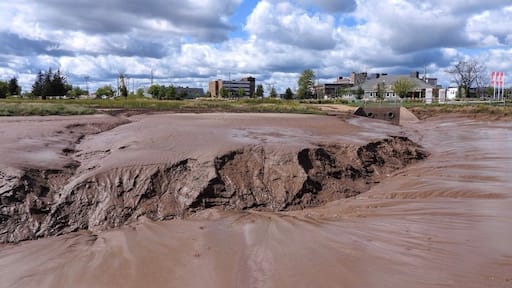 The Petitcodiac River, nicknamed locally as the Chocolate River because of its brown colour thanks to all of the silt. This photo taken at low tide. (September 2019)