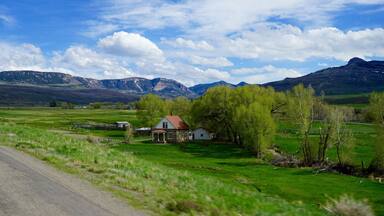 mountain home with tremendous blue sky