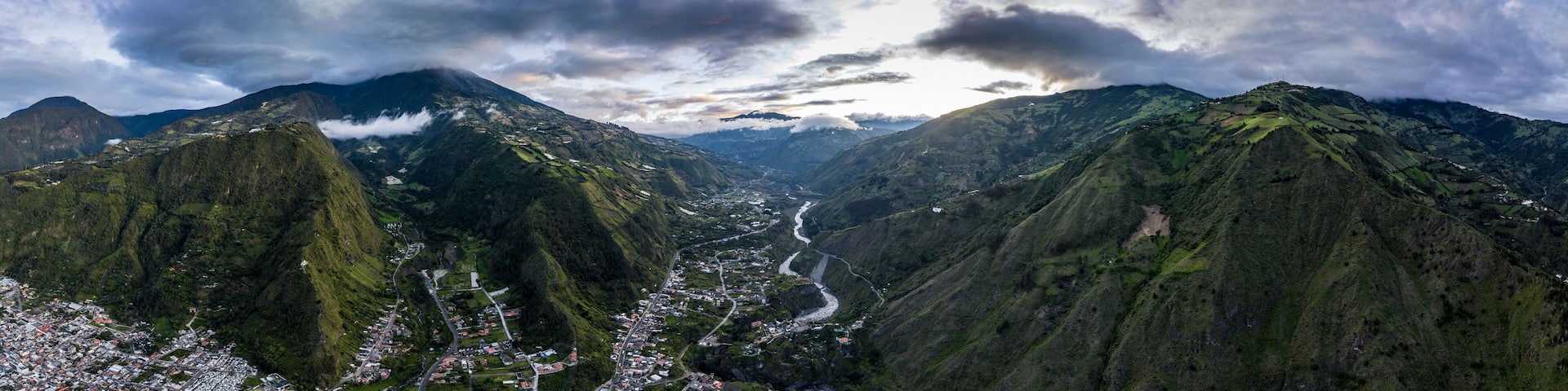 Beautiful aerial view of the Ecuadorian Andes at sunset. City of Banos.