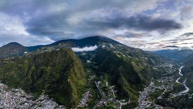 Beautiful aerial view of the Ecuadorian Andes at sunset. City of Banos.