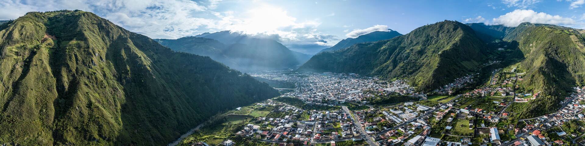 Beautiful aerial view of the Ecuadorian Andes at sunset. City of Banos.