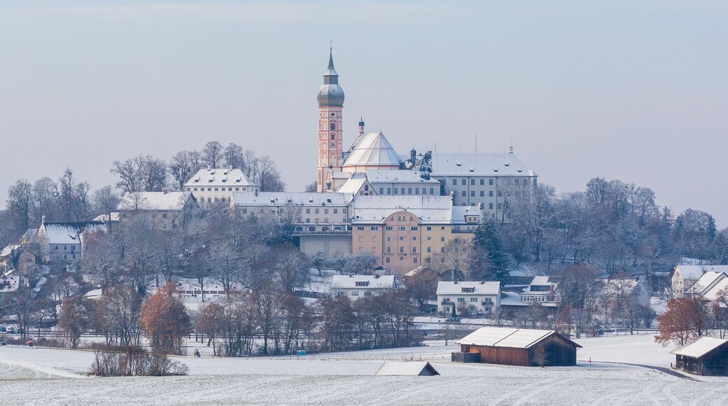 Panorama of Andechs Abbey during winter time. Snow-covered bavarian landscape with famous monastery.
