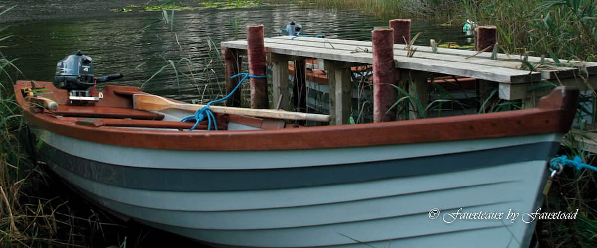 Kylemore Abbey as seen from the boat dock across Lough Pollocappul, Connemara County, Ireland. Technically not a real abbey anymore. This was built as a Benedictine monastery and has now been converted to a private girls school.