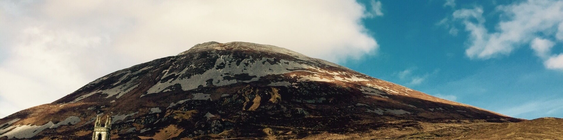 A view of a dun Louie Abbey looking up at donegal highest peak Mt Errical at only 751 m but still a nice walk up and spectacular views of wild donegal