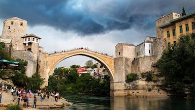 Ominous clouds loom above Stari Most, Bosnia-Herzegovina. Product of car tour in Europe: http://alwayswanderlust.com/why-you-should-tour-europe-with-renault-eurodrive/
