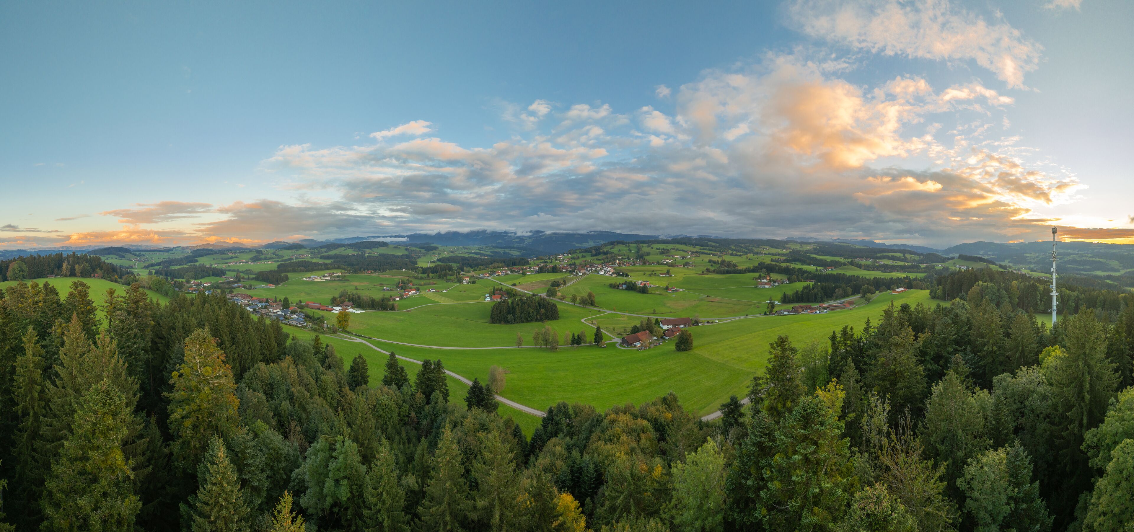 panoramic aerial photo near sunset in the Allgäu Alps next to village of Oberreute, Bavaria, Germany