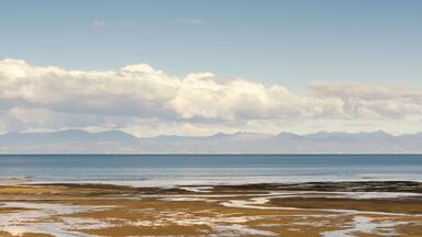 Panorama view on Tasman Bay near Marahau, South Island, New Zealand near the entrance of Abel Tasman National Park. A wonderful area for relaxing, hiking, kayaking and enjoying beautiful nature.