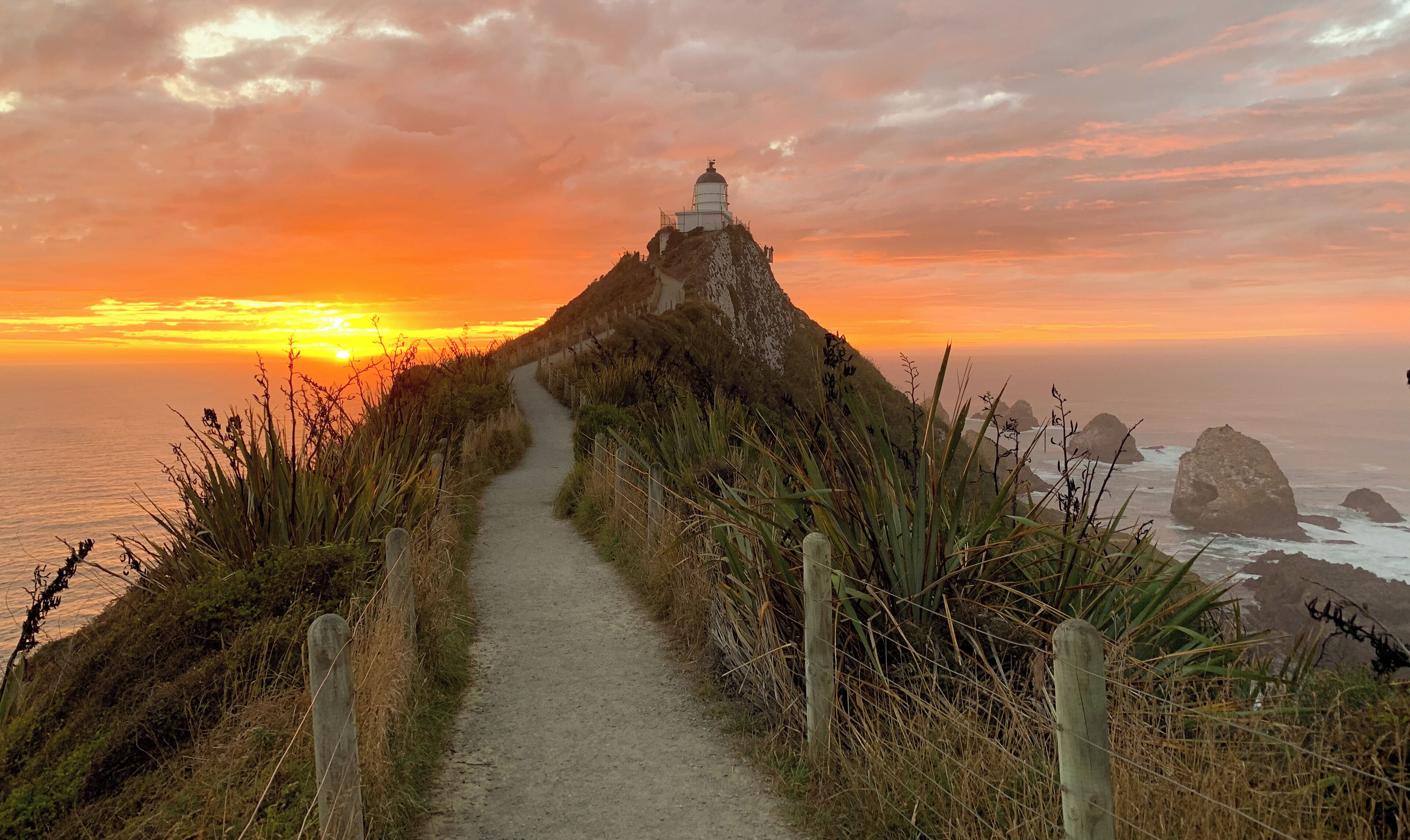 This was taken after a hike in pitch black at 4:30am to the lighthouse.  I prepared the camera and waited patiently and without much sleep to gather the first rays of the sunrise.  It truly was the best sunrise I have seen and well worth the lack of sleep. #Adventure
