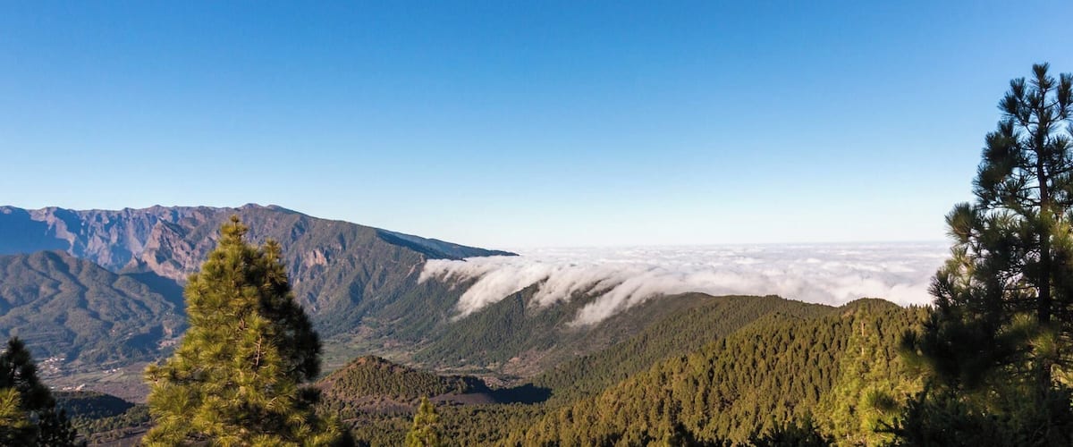 #LifeAtExpedia
Take the long hike from El Pilar to the lighthouse at Los Canarios, on La Palma Island. During the hike, you will see stunning volcanic scenery, from clouds flowing over the edge of the crater walls at Mirador de Birigoyo, to vines growing on volcanic soil, incredible sea views and moon-like desolate landscapes. A truly unforgettable hike!