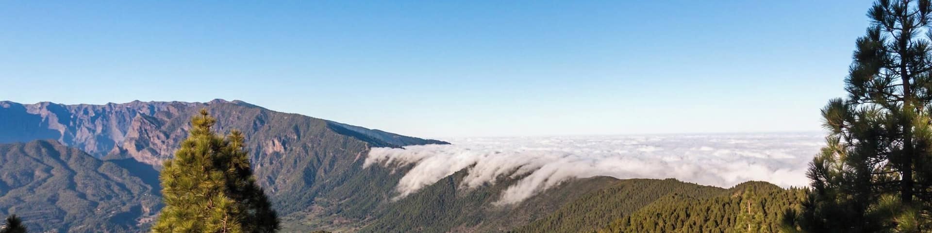 #LifeAtExpedia
Take the long hike from El Pilar to the lighthouse at Los Canarios, on La Palma Island. During the hike, you will see stunning volcanic scenery, from clouds flowing over the edge of the crater walls at Mirador de Birigoyo, to vines growing on volcanic soil, incredible sea views and moon-like desolate landscapes. A truly unforgettable hike!