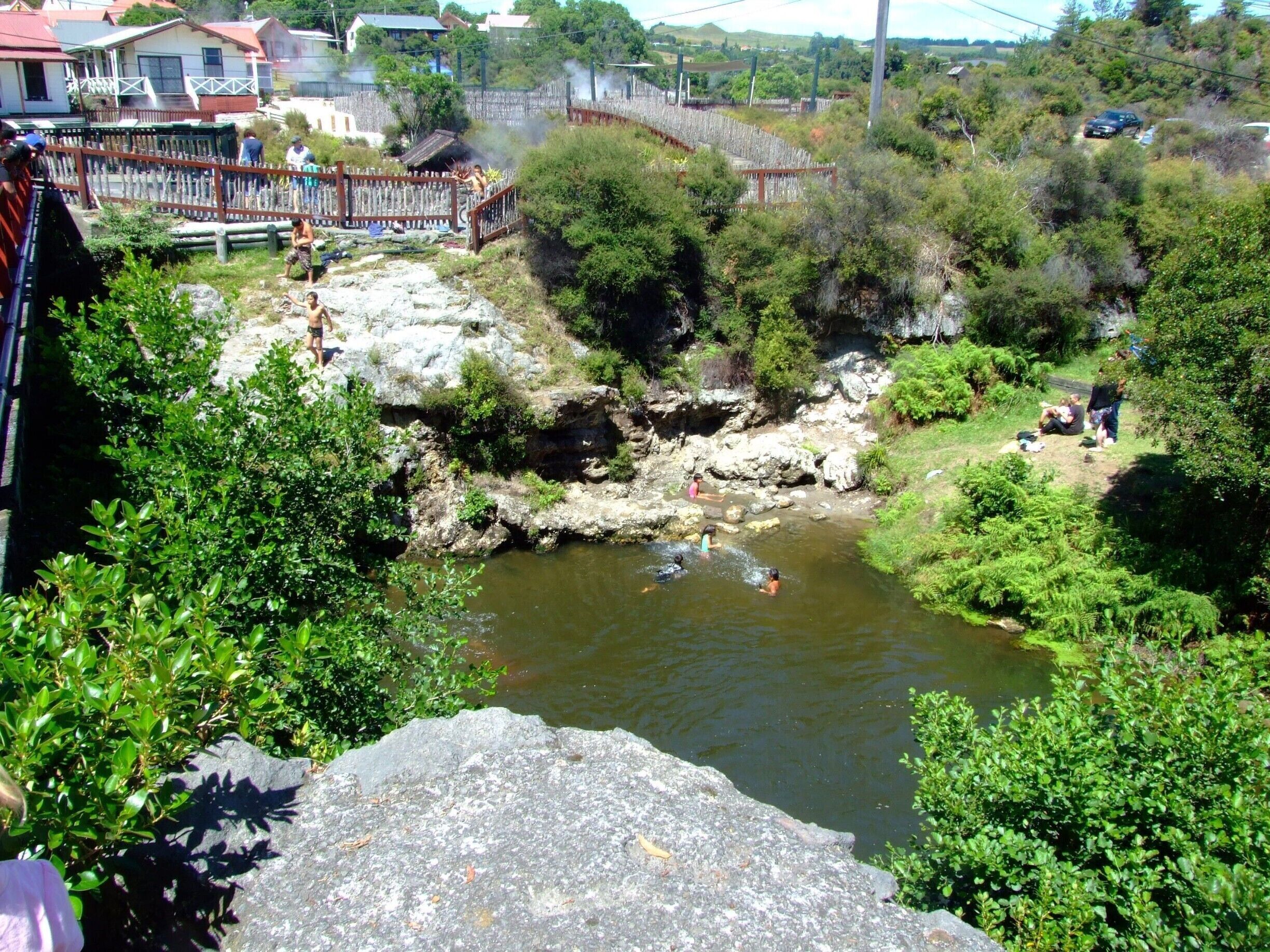In the Maori language Waimangu means "black water". The area was once the location of the most powerful geyser in the world; spewing black mud 460 metres (1,500 ft) into the air. While the geyser became extinct in 1904, this beautiful valley still bears the name Waimangu. 
The Waimangu Volcanic Valley is a 20 minute trip south from Rotorua that must not be missed.