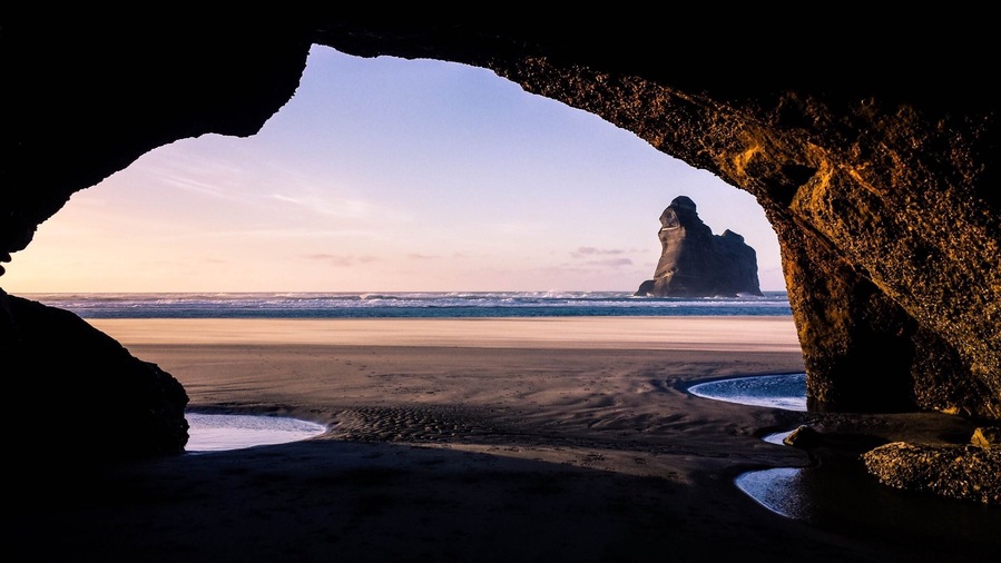 My absolute favorite beach in New Zealand. Disconnect from the world and get in touch with White sand beaches, caves, coastal tracks and a seal colony.