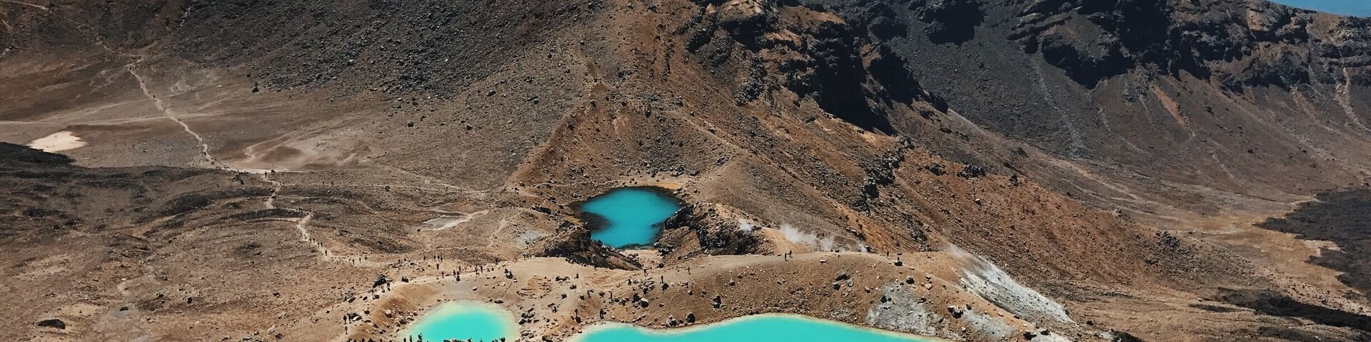 The Tongariro Alpine Crossing is the most beautiful day hike in the north island of New Zealand, and possibly the world too. The 19km hike takes around 6 hours depending on how often you stop to enjoy the incredible views, such as at the emerald lakes see in this photo. There's a lot of hiking involved so bring plenty of water and wet weather gear incase the weather takes an unexpected turn.