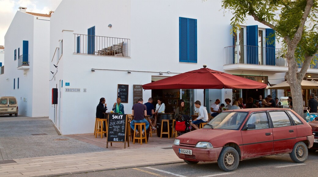 Pilar de la Mola which includes outdoor eating as well as a small group of people