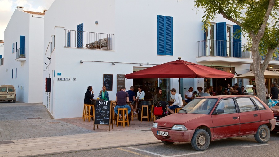 Pilar de la Mola which includes outdoor eating as well as a small group of people