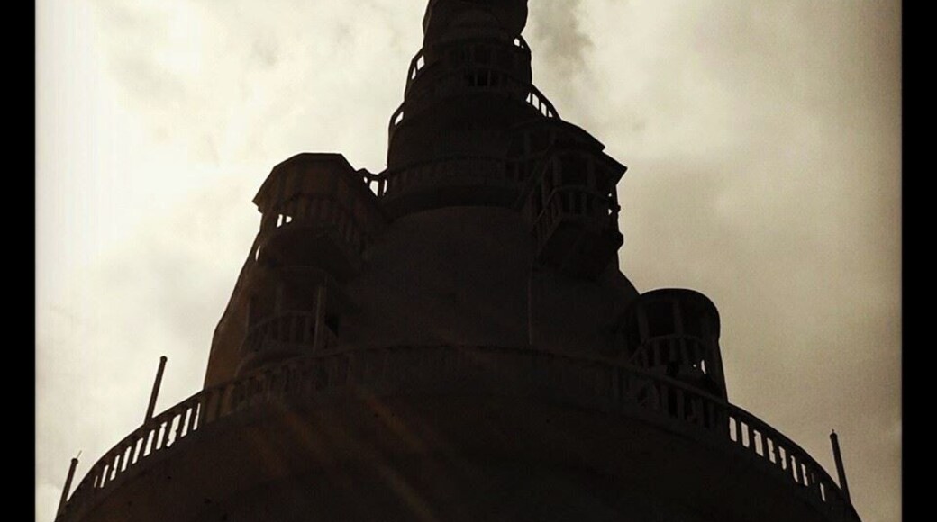 Ambuluwawa peak situated in the center of Gampola Kingdom established by the great Sinhala King Buvanekabahu IV. (1341-1357 AD) was hitherto not put into any use. Height of the peak trom the mean sea level is 365 feet and from the Gampola town is 1965 feet Mayura Sandesa, the messenger poem written in the 14th Century describes this enchanting rock and the surroundings thus:
When the planets and stars disappear trom the sky and when the nectar appears in or drops from flowers on tree tops and when the sun spreads its rays as it rises over the mountain of the east, you may set off trom Ambuluwakada happily.