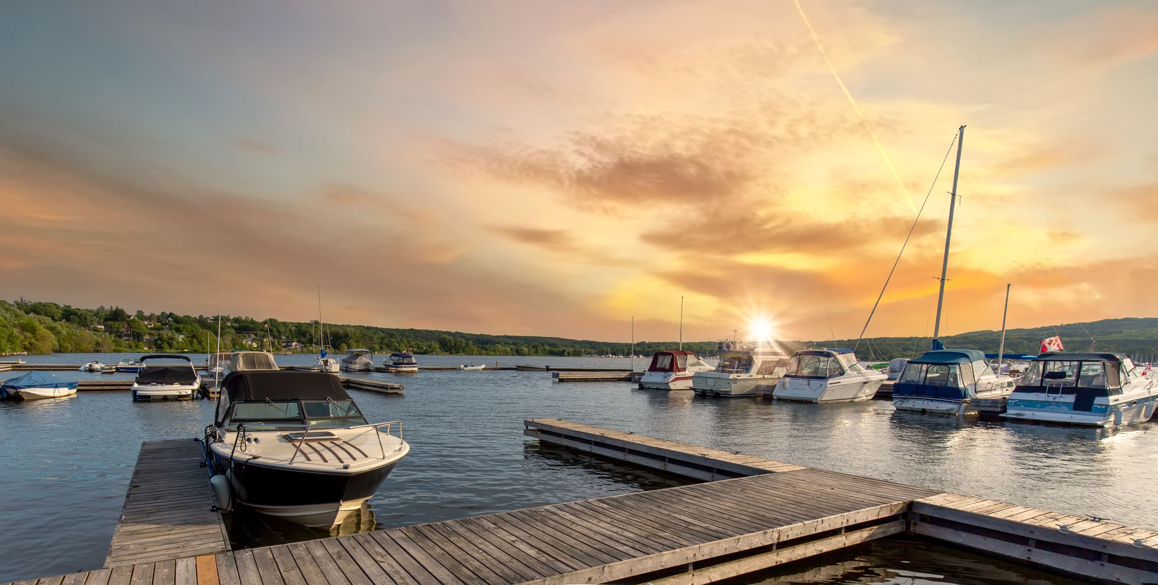 A boat waiting for a ride on a lake near Georgian Bay and Blue Mountain resort in Muskoka, Ontario.