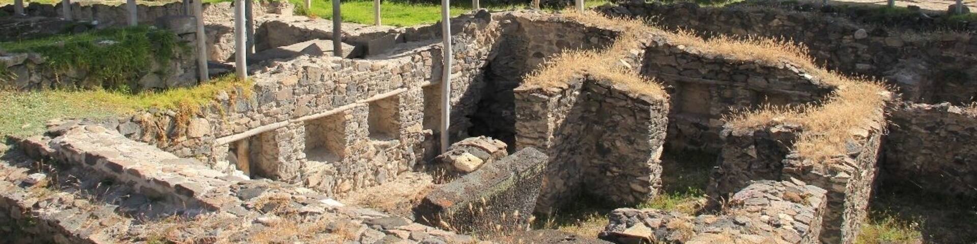20km north east of Ayacucho, on the road to Quinua (not sure if the position on the map is EXACTLY correct) are the ruins of the capital of the Wari empire.
The Wari ruled from 600AD to 1100AD and therefore pre-date the Incas.
The extensive ruins are scattered among endless fields of Opuntia cacti and Prickly Pear, and these were more of a fascination to me than the ruins themselves.
Despite being so exposed, the site felt quite mysterious and strangely eerie: we didn't see a single other tourist there, but we did see swarms of locusts (which, at first we mistook for birds).
It's a beautiful spot, the views are amazing on a clear day and you'll see plenty of colourful butterflies and flowers. But remember to bring water, as the site is literally in the middle of nowhere, so there are no opportunities to purchase any nearby.
You can catch a local bus, combi or shared taxi to the ruins, but be wary of stopping too late. We stayed until dusk, and ended up having to hitch a ride back to Ayacucho because - I assume - we'd missed the last lot of public transportation heading that way.