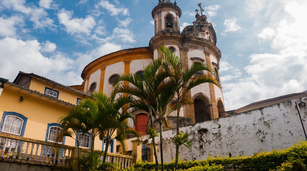 Ouro Preto, Minas Gerais, Brazil: The famous Church of Saint Francis of Assisi, a Rococo Catholic church in Ouro Preto, Brazil in a cloudy sky day
