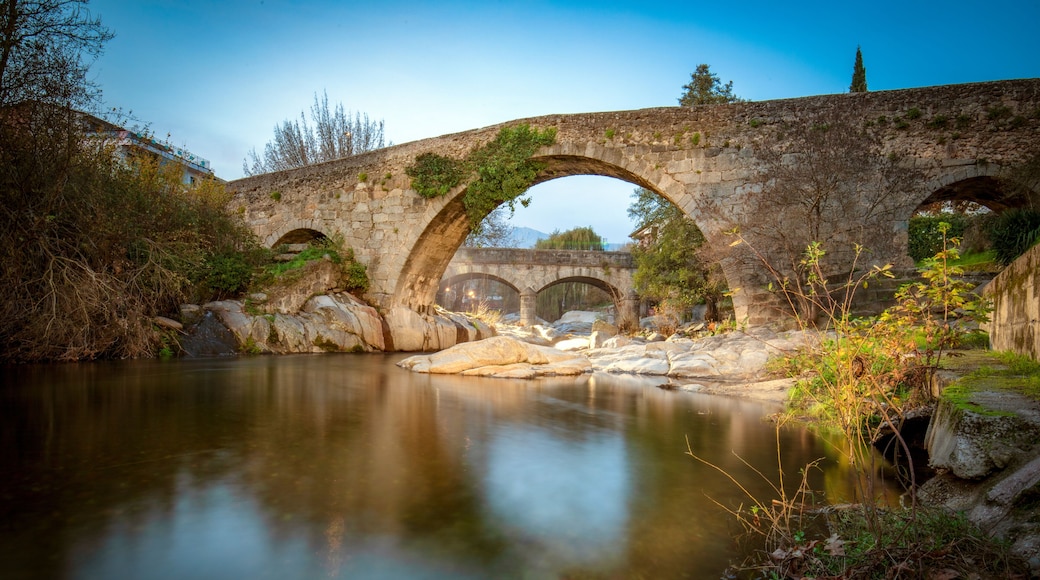 View of the medieval Aquelcabos bridge over the Arenal river in Arenas de San Pedro, Avila, Castilla y Leon, Spain, in the afternoon