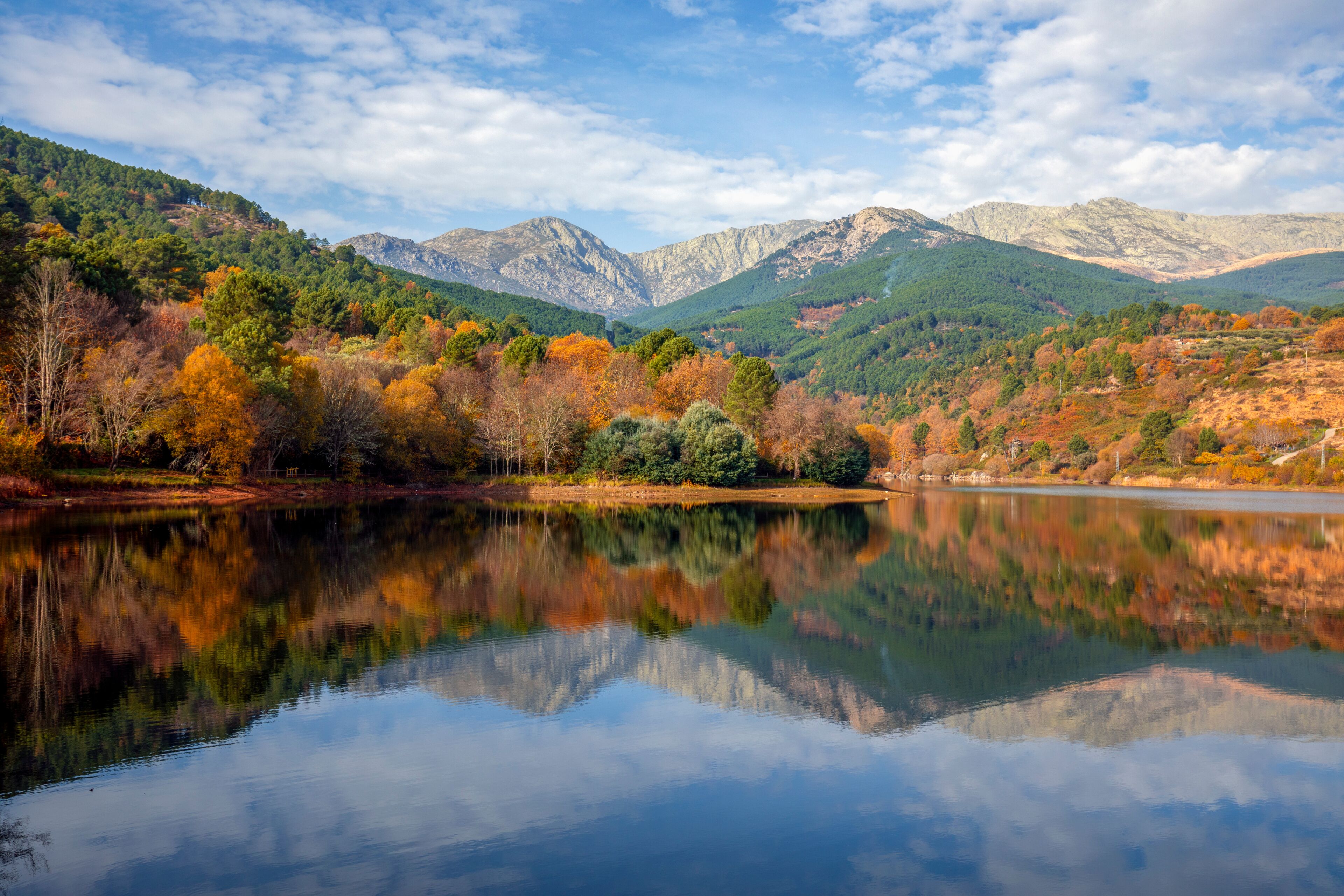   Beautiful autumn view of the Sierra de Gredos from the Riocuevas reservoir in Arenas de San Pedro, Avila, Castile and Leon, Spain