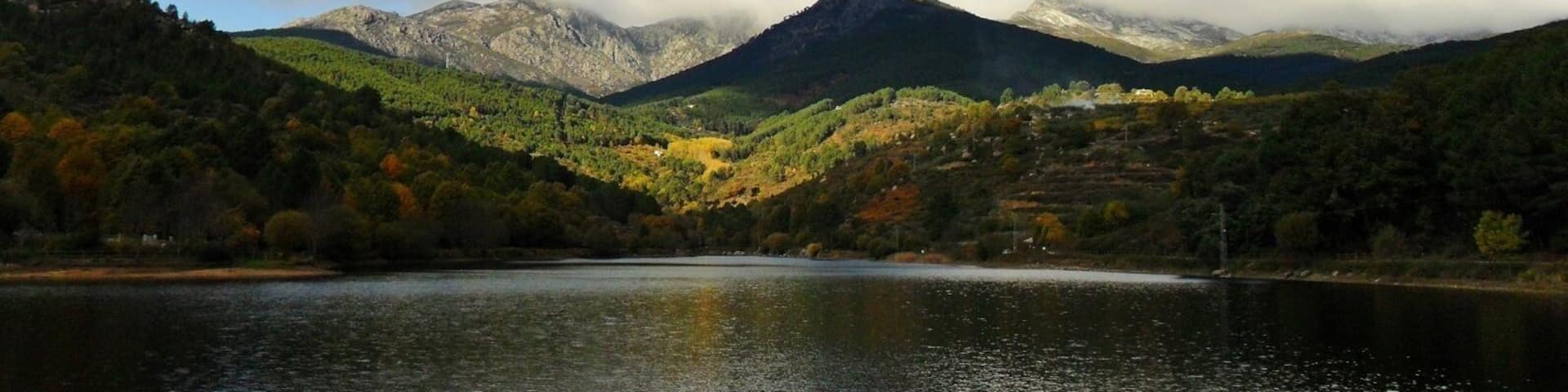 View of the Arenas de San Pedro reservoir and the Sierra de Gredos mountain range at the background.