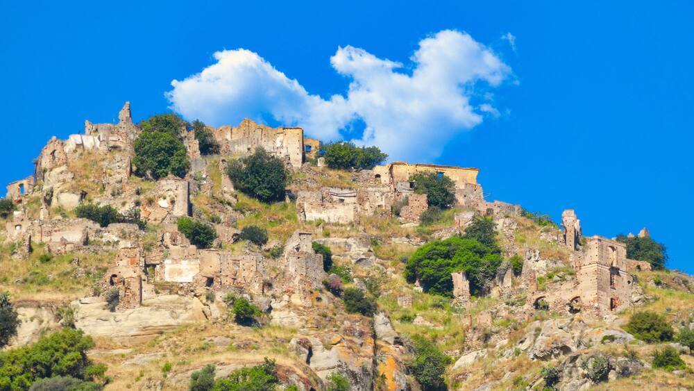 Ruins of an abandoned village in the mountains.