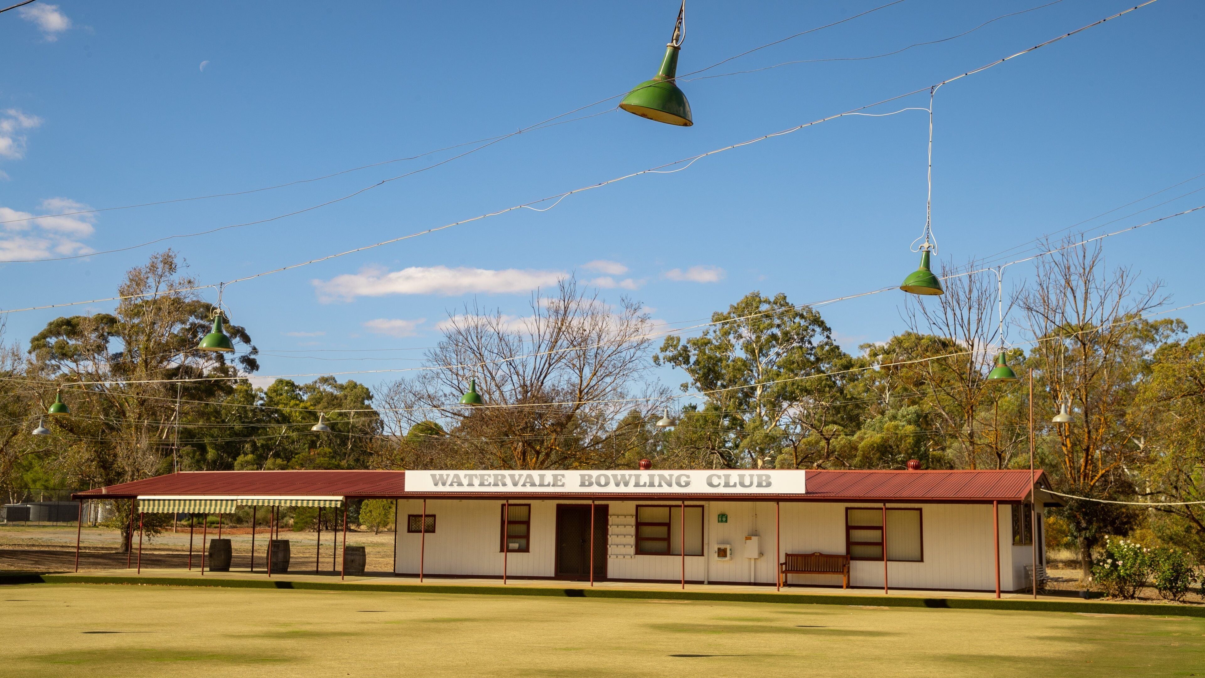 Watervale showing signage and a small town or village