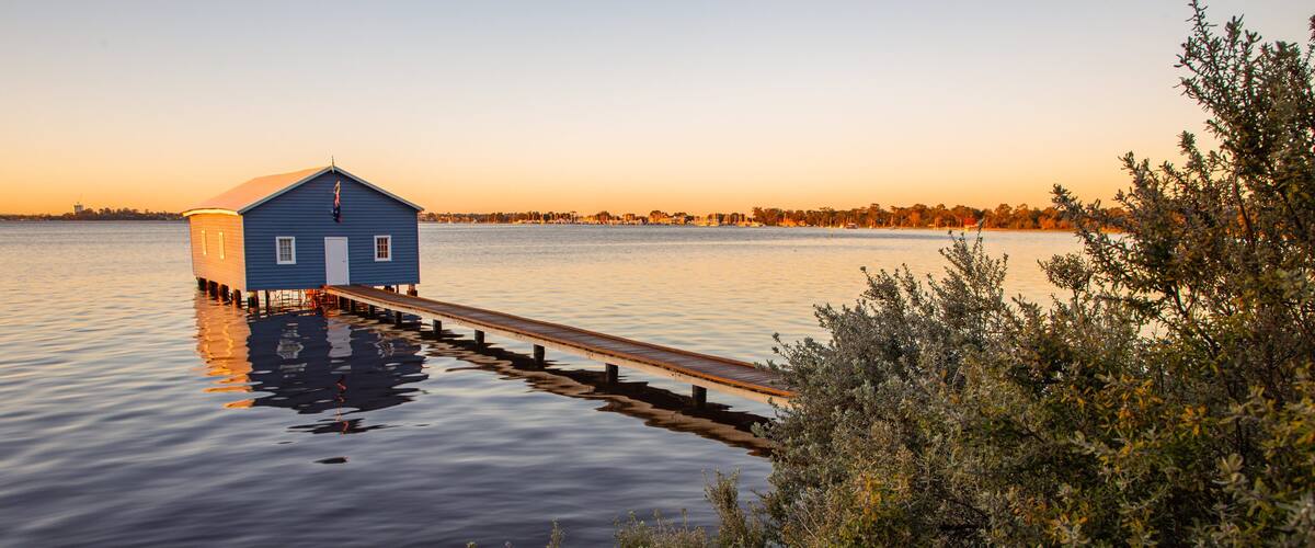 Crawley showing a sunset and a lake or waterhole