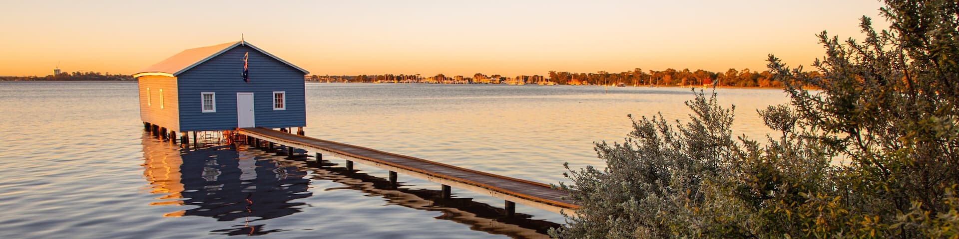 Crawley showing a sunset and a lake or waterhole