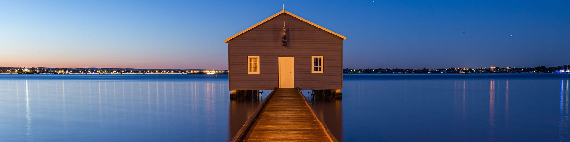 Crawley showing a lake or waterhole and night scenes