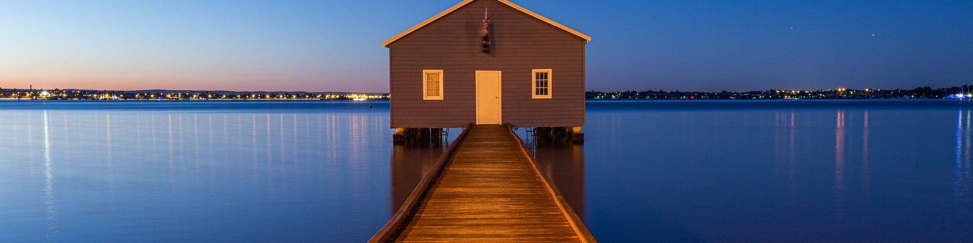 Crawley showing a lake or waterhole and night scenes
