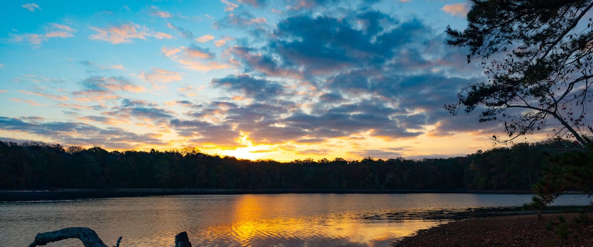 Sunrise just starting to peak over the water on Lake Chickamauga, Harrison Bay State Park, Tennessee