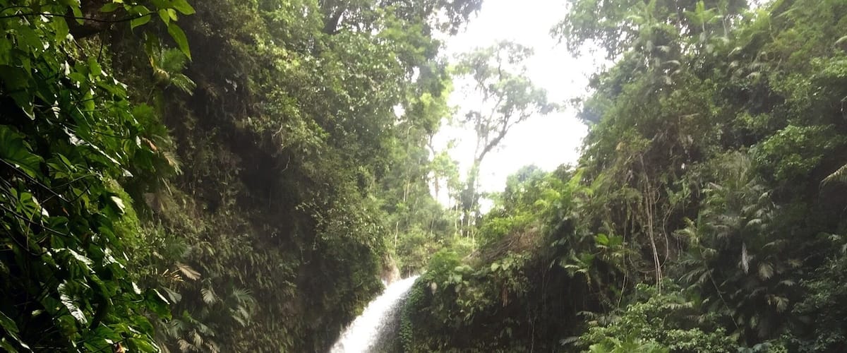 Tiu Kelep Waterfall in Senaru, Lombok, Indonesia. The walk there is a great thing to do if you arrive for your a Rinjani trek the day before with time to spare.