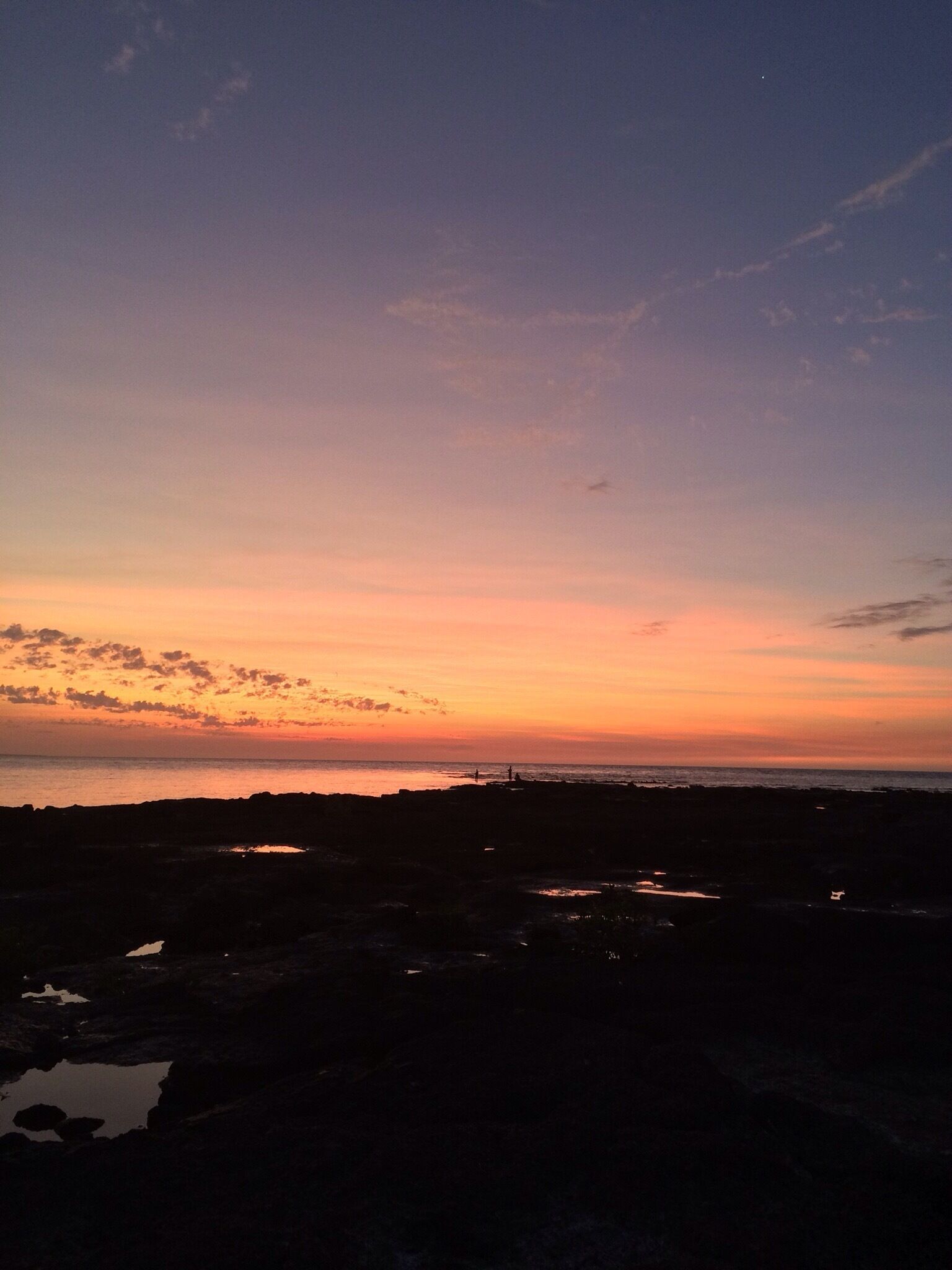 #GoldenHour at East Point in Darwin, Australia.  
East Point is close to Darwin CBD and at the top end of Fannie Bay.  
I first went there, from Melbourne, in 1982 and it was a reserve.  In 2015, it is still a reserve; now, with recreational facilities that come with the passage of time!  
It is a special place for me linked to love, survival and change; a long story, a story too long to retell here!  
If one happens to be in #Darwin, do go there and delight in the rocks, cliffs and sea.  
Watch out for the changing tides though!  
🇦🇺
#iPhoneonly
Top End #NorthernTerritory #roadtrip.
P.S.  Spot the fishermen and the moon!  😉