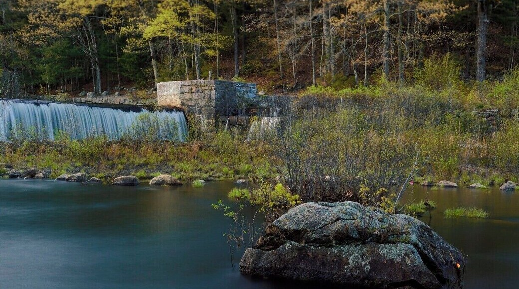 These falls once powered a set of mills in Hope. On the rocks just above the falls was a small house which controlled the rate of the water. That small house has long since disappeared.
Also disappeared is the work which once went on in those mills. They are left empty.
This is a popular fishing and kayaking spot.