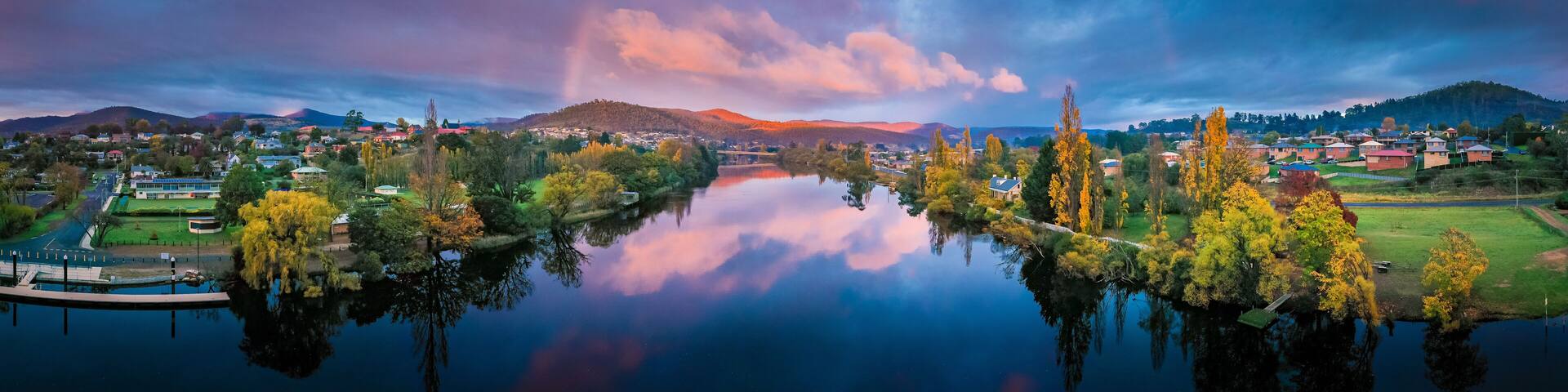 Panoramic shot of New Norfolk town in Tasmania, Australia during sunrise