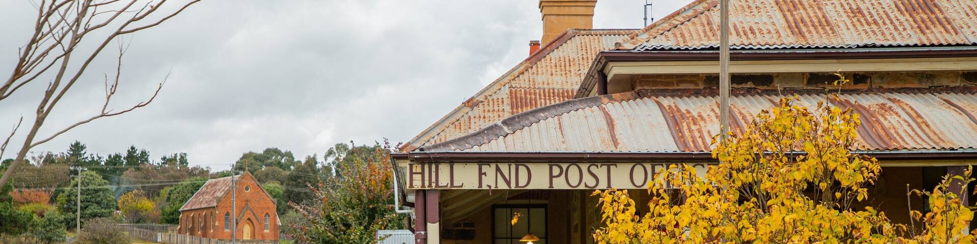 Hill End showing a small town or village and a house