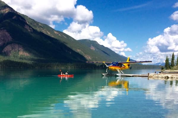 That's Debbie and me paddling around clear green Muncho Lake... Planes take off and land right from the water...