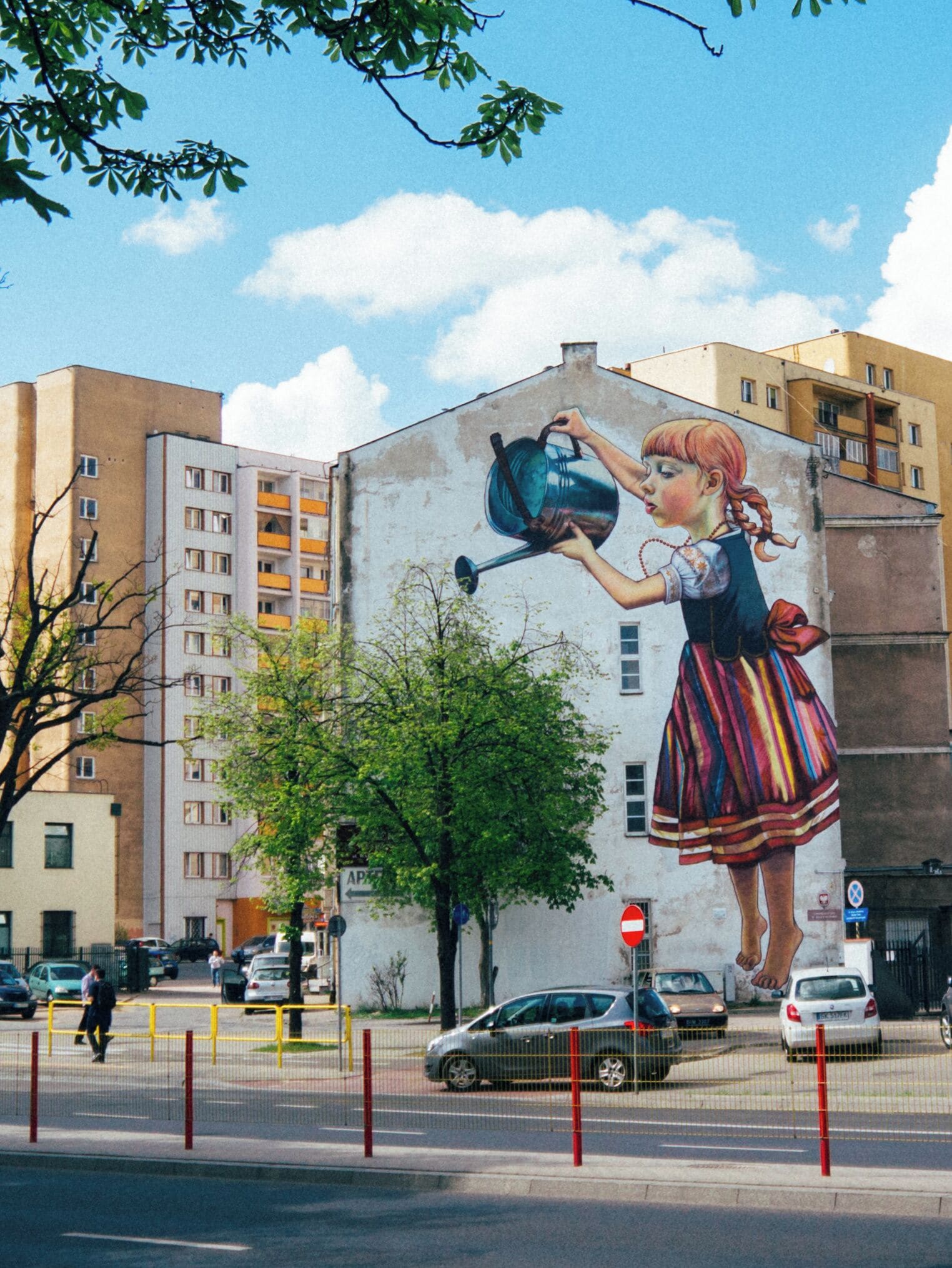 The Polish street artist, Natalia Rak, painted this stunning piece of a young girl wearing a traditional polish outfit while watering a tree. This piece was part of the Folk On The Street Festival. It's such a refreshing, so to speak, art to see while wandering around Bialystok. #LifeAtExpedia #bialystok #poland