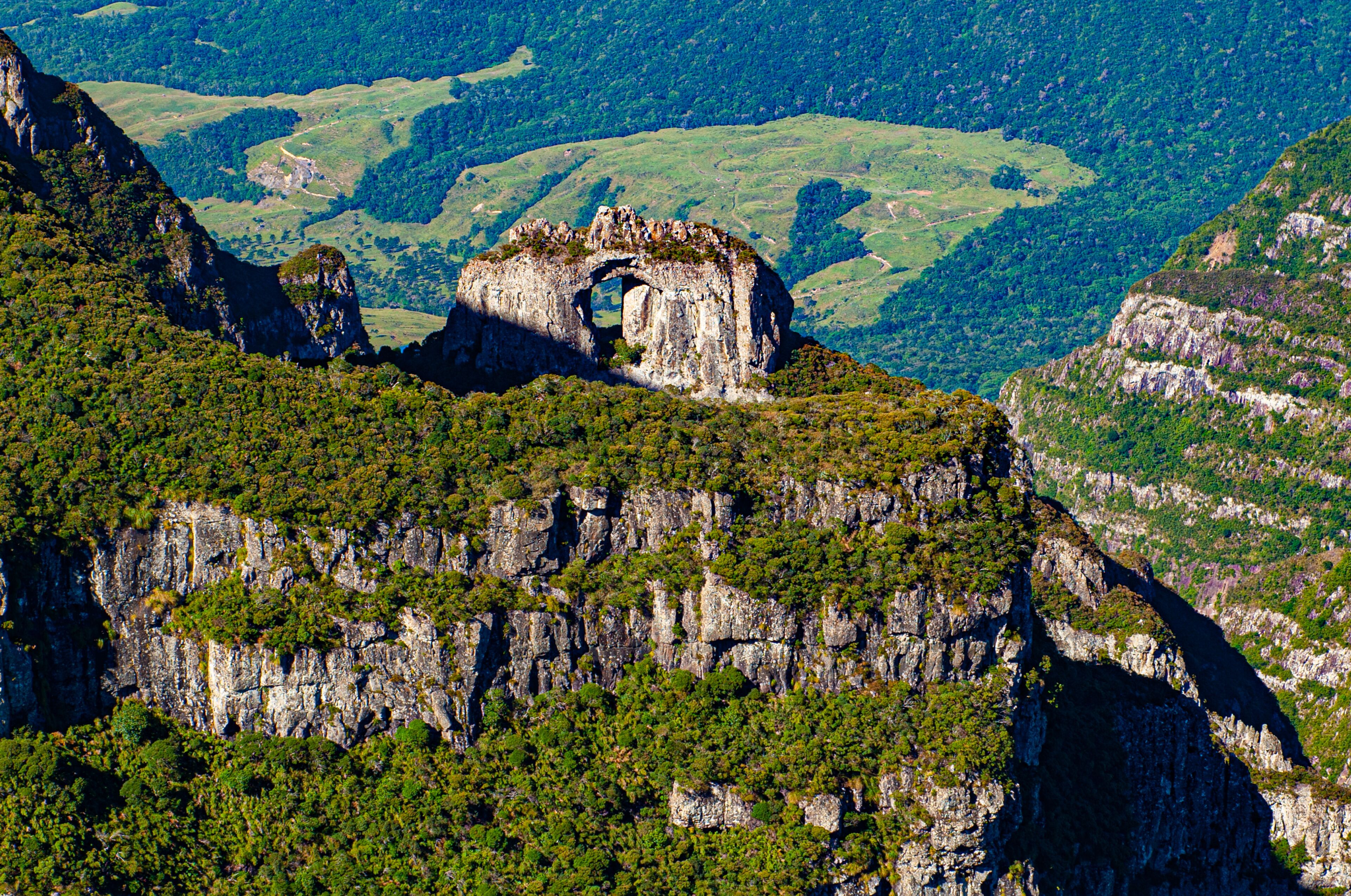 View of Pedra Furada in Morro da Igreja at 1822 meters of altitude, located between the border of the municipalities of Urubici, Bom Jardim da Serra and Orleans in Santa Catarina, Brazil.
