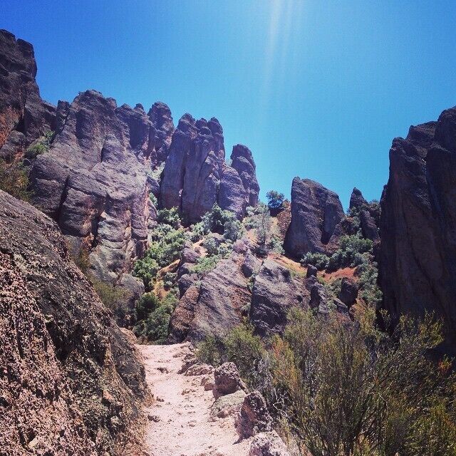 A rocky canyon with a narrow trail.