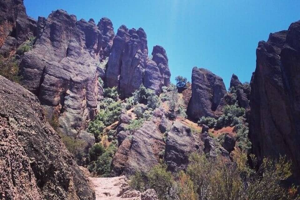 A rocky canyon with a narrow trail.