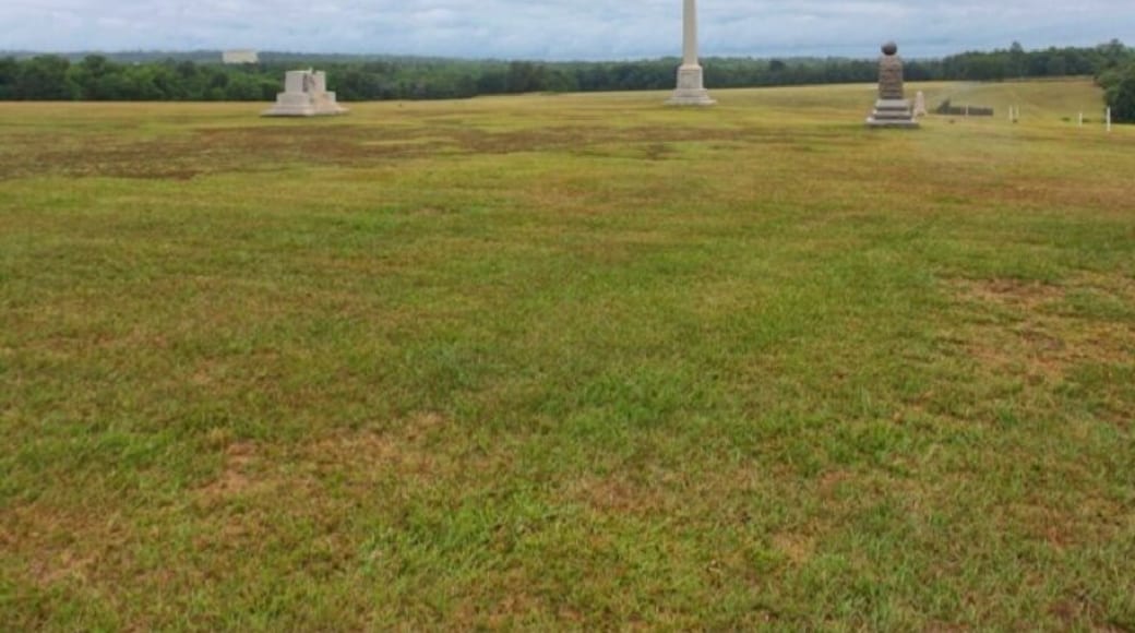 You are looking at what would be the main body of the prison, now just a field. This field has monuments thought along with a museum on the north lawn and information everywhere that gives insight to the living conditions, history, and representation of where the walls were originally. This place is eerily unique and gives an amazing account of our country's sometimes pained past.
Possibly the worst prison of the Civil war. The prison, which opened in February 1864, originally covered about 16.5 acres of land enclosed by a 15-foot high stockade. In June 1864 it was enlarged to 26.5 acres. The stockade was in the shape of a rectangle 1,620 feet by 779 feet.
At Andersonville, a light fence known as "the dead line" was erected approximately 19 feet inside the stockade wall. It demarcated a no-man's land that kept prisoners away from the stockade wall, which was made of rough-hewn logs about 16 feet high. As was the similar fate facing Confederate prisoners in Northern camps which employed the same "dead line" fence, anyone crossing or even touching this line was shot without further command of any kind by sentries located in the pigeon roosts.