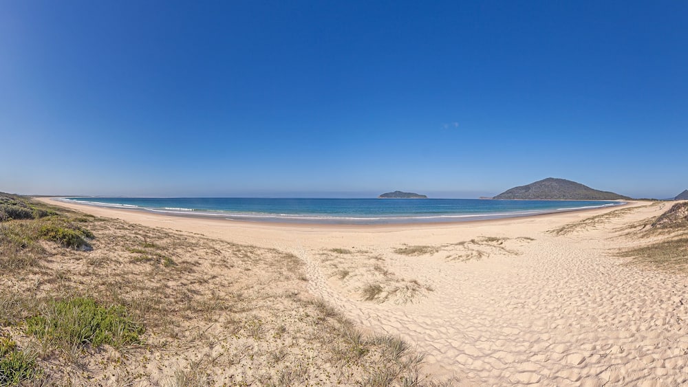 Panorama over a paradisiacal beach on the Australian Golden Coast in the state of Queensland