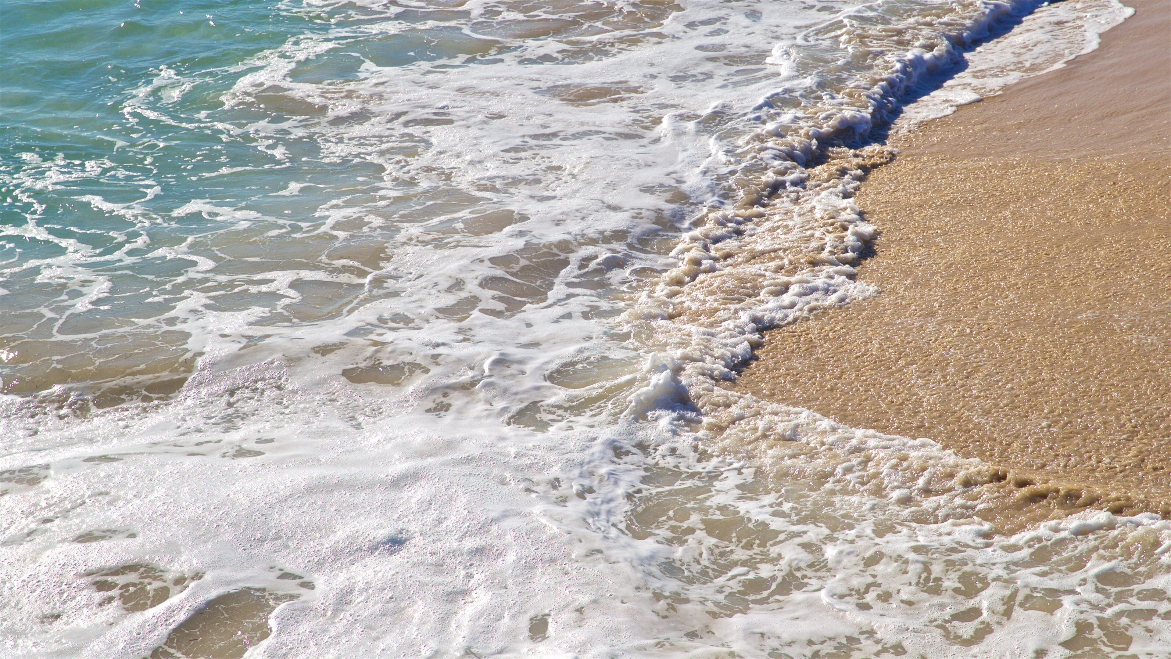 City Beach which includes general coastal views and a beach