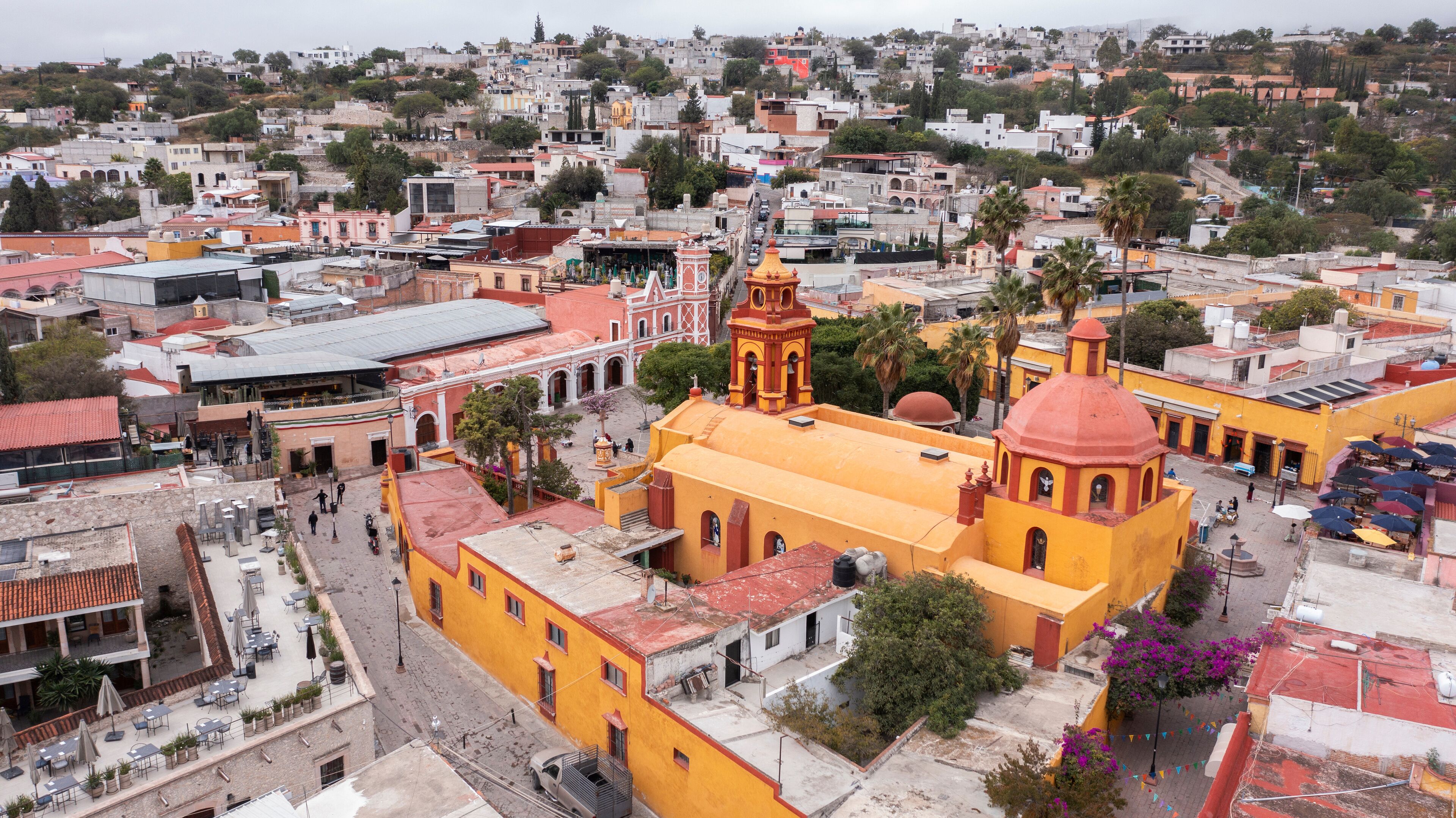 Misty morning view of the historic colonial church and city center of Bernal, Querétaro, Mexico.