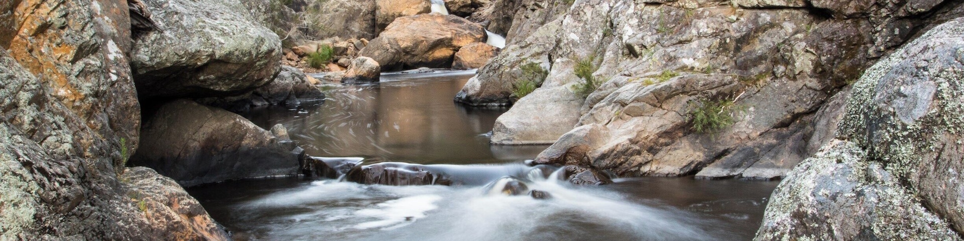 The falls at Micalong Creek just south of Wee Jasper. Wee Jasper is a small village with a population of around 275 people, according to the Australian Bureau of Statistics, although it swells to nearly 2000 over the Christmas/New Year period. Its eighty minutes North West of Canberra and 45 minutes South West of Yass nestled not far from the Goodradigbee River and the Hume and Hovell walking track. 
Be warned there is not much there, both the General Store and Hotel where closed until further notice when I visited so take your own provisions.
