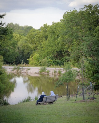Two muslim women enjoying the outdoors together in summer