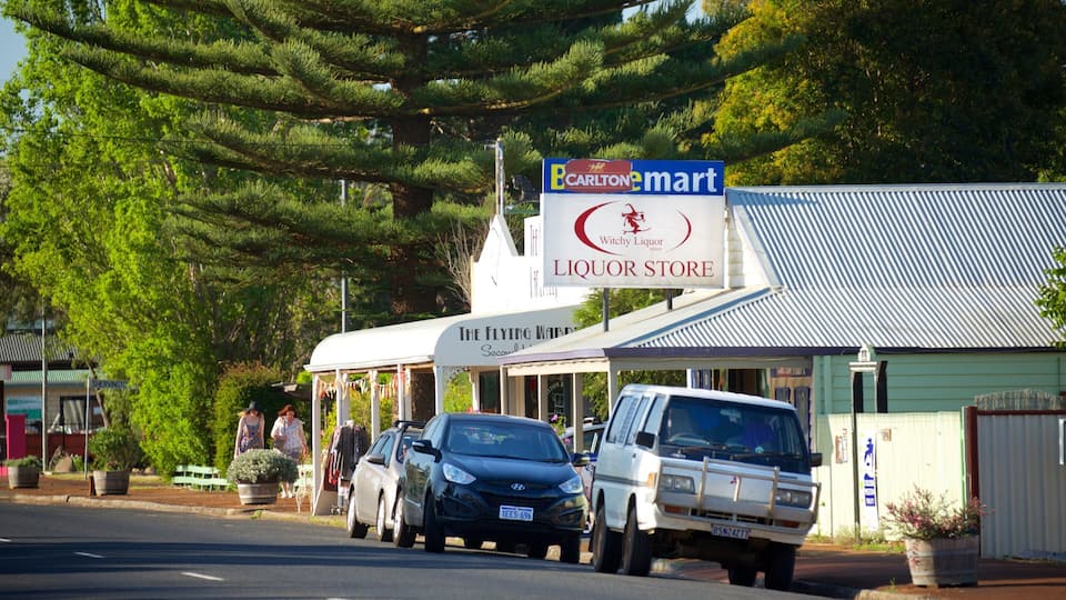 A liquor store with a sign for Barlinton's Mart and a Flying Wardrobe.